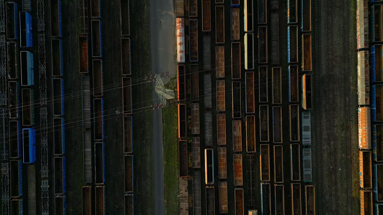 No engines roar, no trains in sight, sea of steel in the fading light