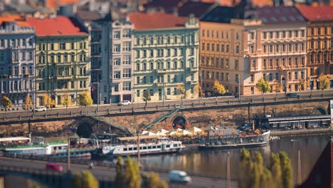 Busy-traffic-on-the-miniaturized-Vltava-River-embankment-in-Prague-city