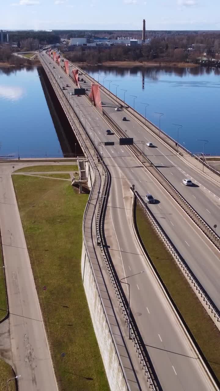 Bird's eye view of cars entering and exiting Southern Bridge, Riga, aerial