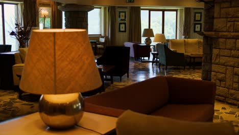 elegant hotel lobby with stone walls and comfortable seating