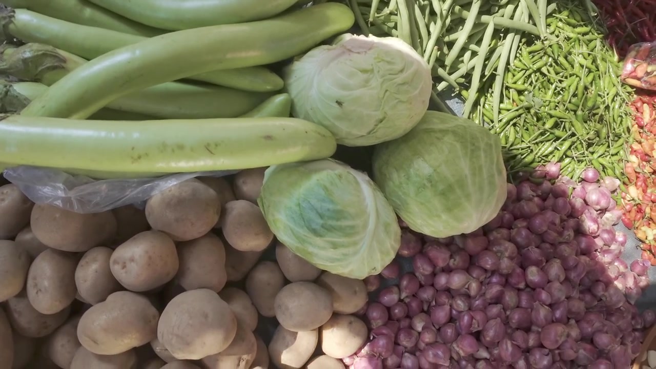 Assortment of Fresh Vegetables at a Local Market Stall