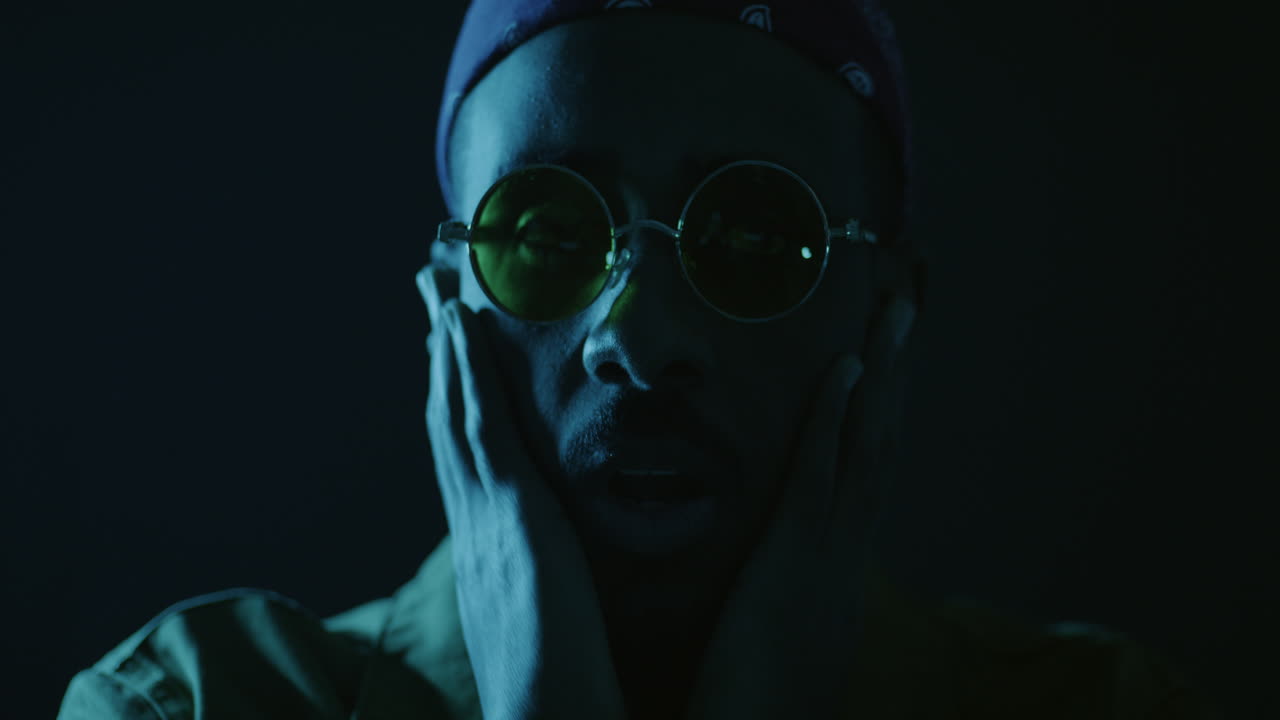 Stylish Man in Neon Lighting