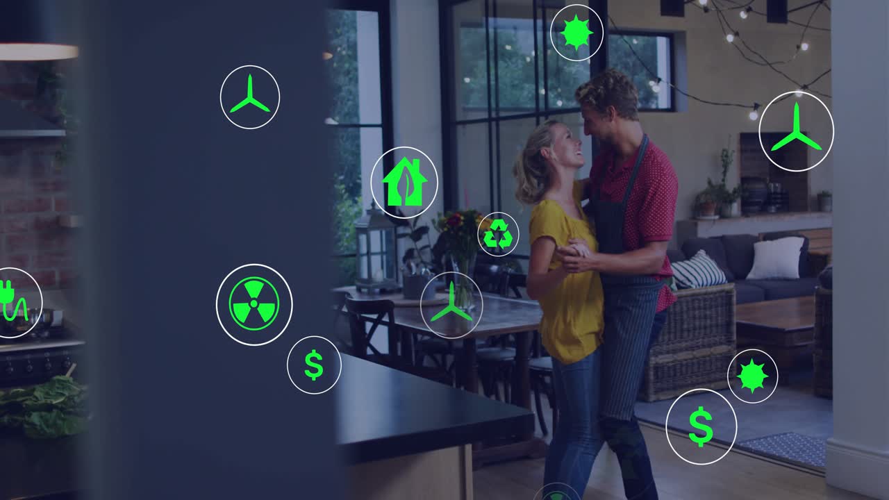 Couple clasping hands, dancing in home kitchen as green energy icons settling across scene