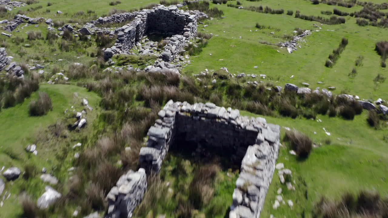 Desereted village fallen rock wall ruins at slievemore achill island ireland