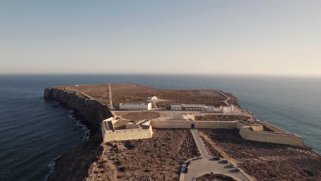 Cinematic-aerial-elevation-shot-of-historical-defensive-fort,-Sagres-Fortress,-Algarve-Portugal