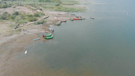 an aerial view of some local indian fishing boats