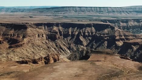 Fish-River-Canyon-in-Namibia,-Africa-Aerial-Drone-Shot