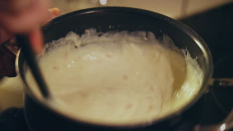 mixing nacho cheese sauce slow motion