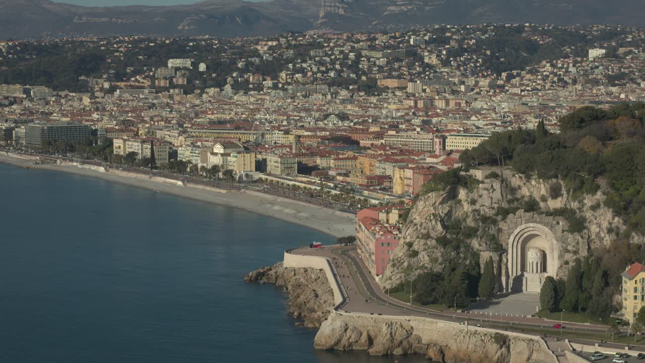 Aerial view in French Riviera with people on the beach in Nice during summer day with a long lense
close to forest
Long travelling drone shot in the french riviera during summer