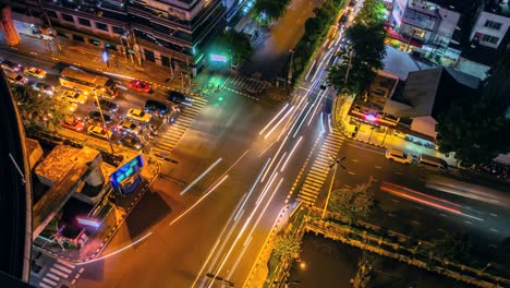 4k.time lapse traffic at intersection bangkok