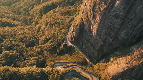 aerial view of one of the most beautiful and dangerous rainforest mountain roads in the world, serra do corvo branco, grão pará, santa catarina, brazil