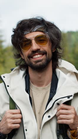 smiling man on a hiking trip