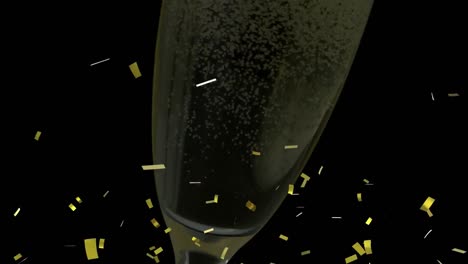 Animation-of-golden-confetti-falling-over-glass-of-champagne