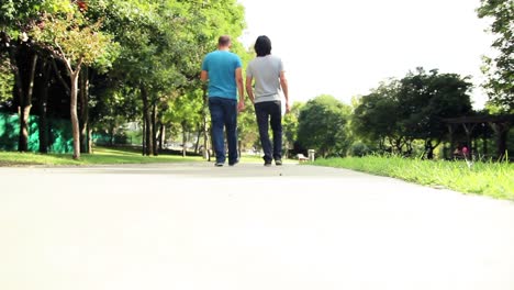 young men walking forest in leisure time