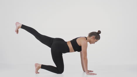 woman performing yoga exercise