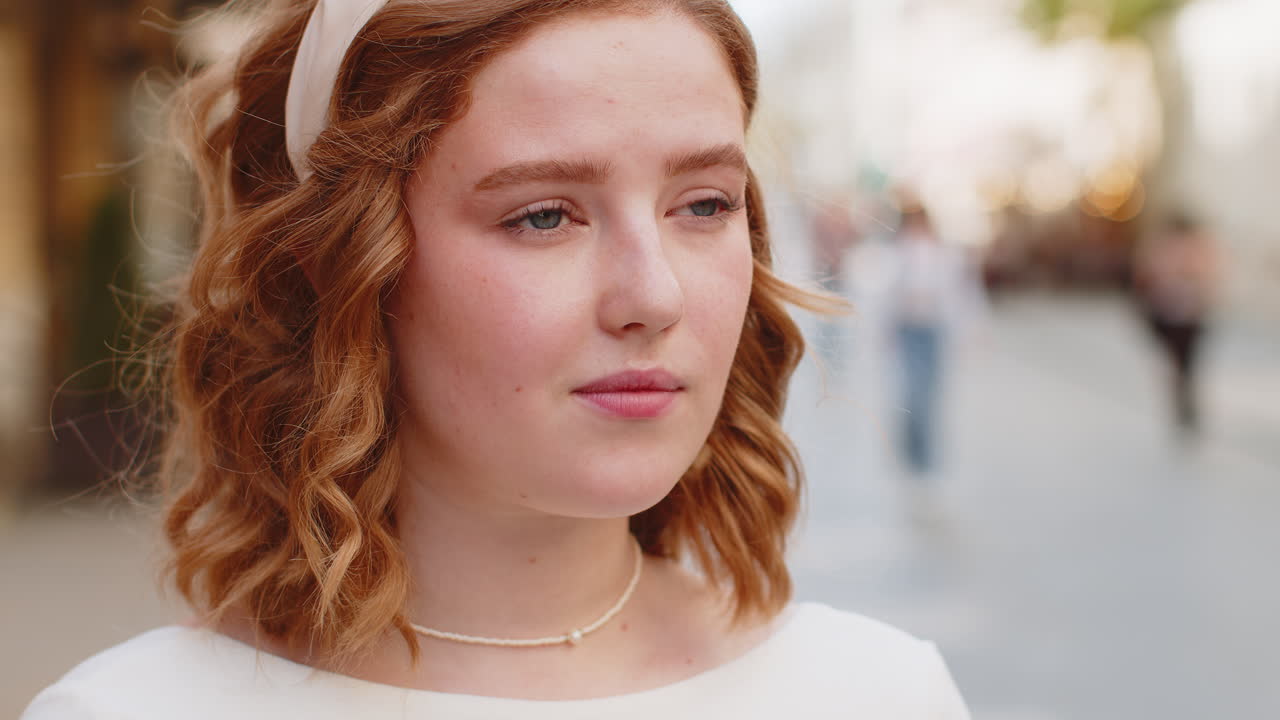 Closeup portrait of happy young satisfied woman face smiling friendly open eyes glad expression