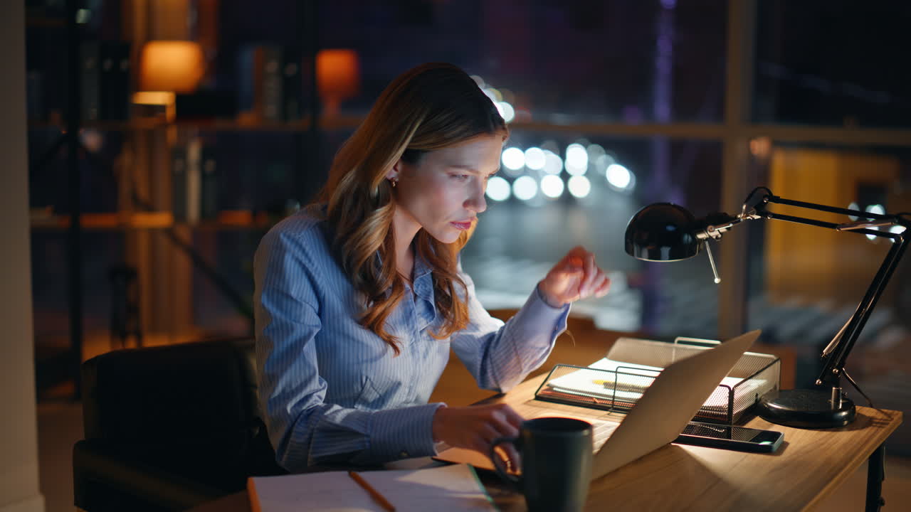 Serious ceo planning project typing laptop late office closeup. Woman writing