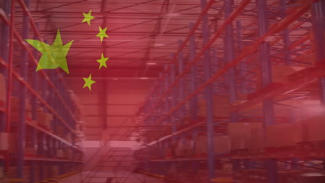 animation of waving national flag of china over empty warehouse with boxes on shelves and ladder
