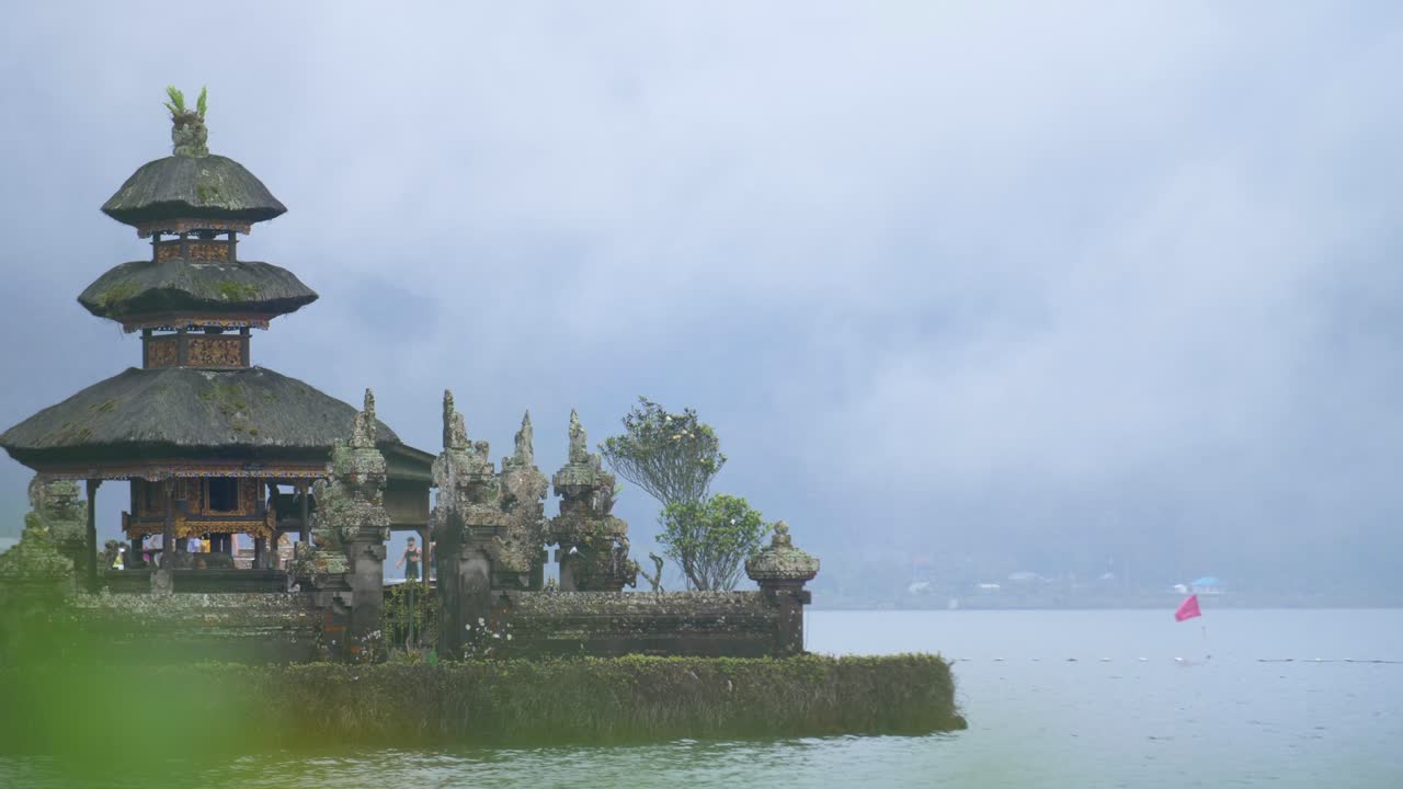 Free stock video - Small pagoda on an island in bratan lake