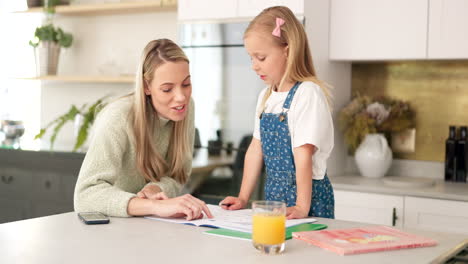 Education,-mother-and-girl-writing-in-kitchen