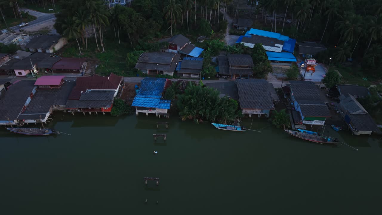 Aerial View of a River Village at Dusk