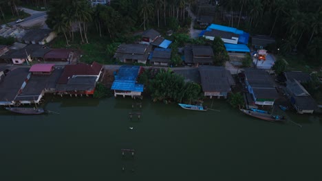 aerial view of a river village at dusk