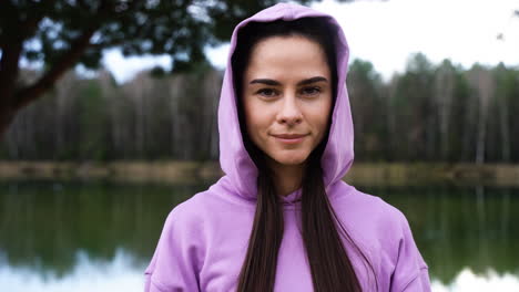 Woman-wearing-hoodie-outdoors