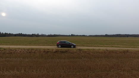 car driving, sideways drone shot