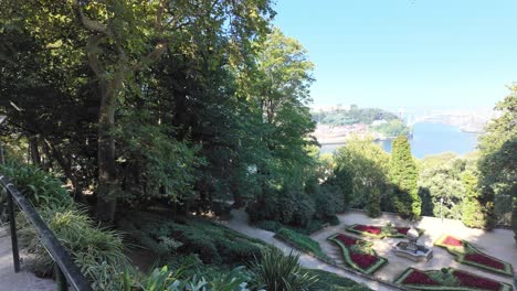 a lush garden scene with walking paths and greenery in the porto crystal palace gardens