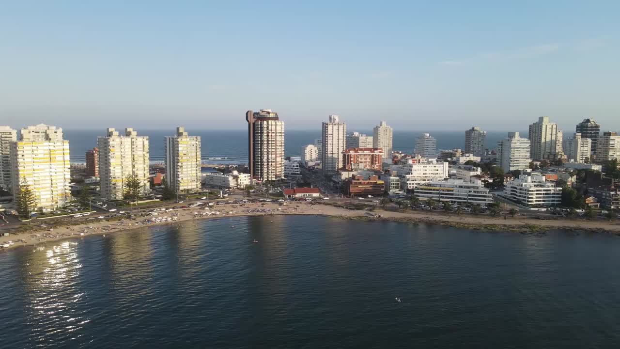 Aerial view of punta del este coastline, uruguay, featuring playa mansa beach, modern buildings, and the atlantic ocean