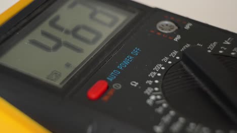 numbers jumping up and down on electronic multimeter