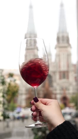 red wine at a cafe with city views