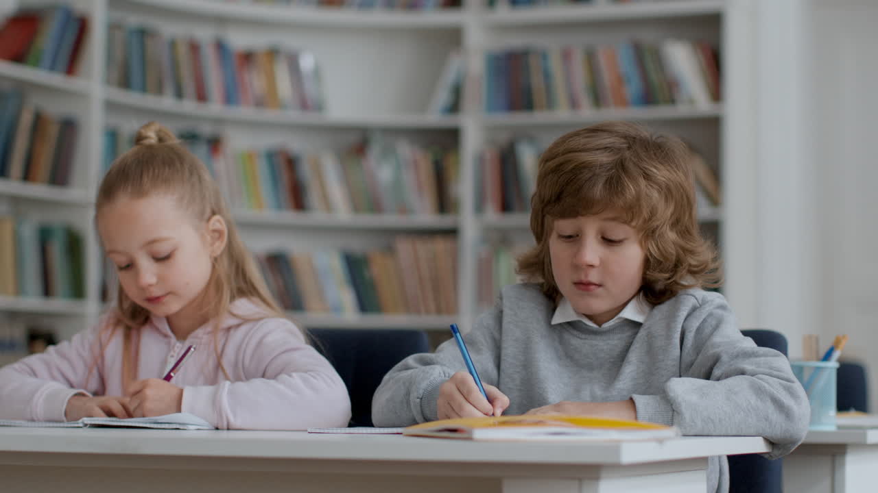 Children Studying in a School Library
