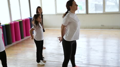 teacher and pupils in dance class