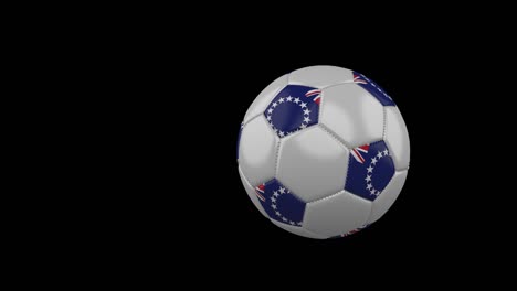 cook islands flag on flying soccer ball on transparent background, alpha channel