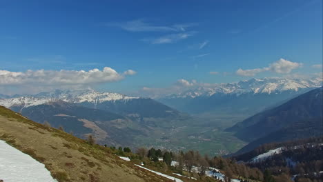 Stunning-mountain-landscape-with-blue-sky,-aerial-drone-view