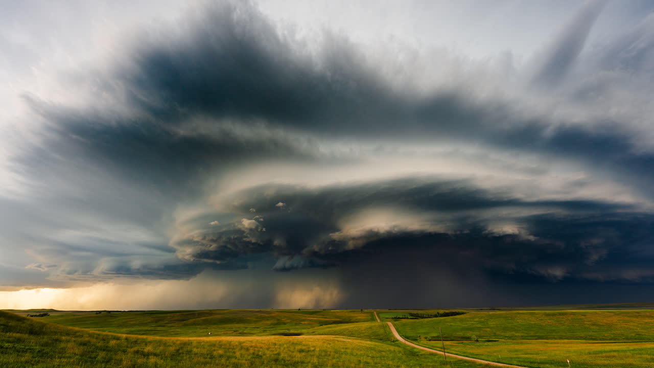 Powerful storm clouds churn across wide sky severe weather approaches