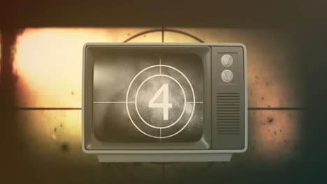 animation of film countdown in antique television over moving film reel in background