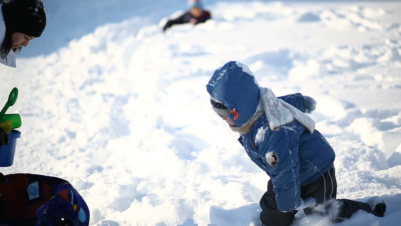 Mother and son walking in winter. Mother and son spending time together in winter day