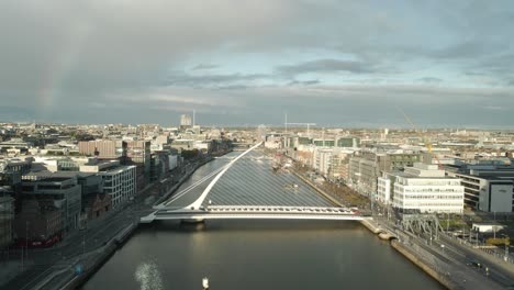 modern cityscape with samuel beckett bridge over the river liffey in dublin, ireland