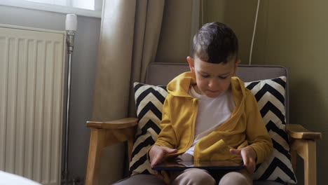 kid sitting on a chair