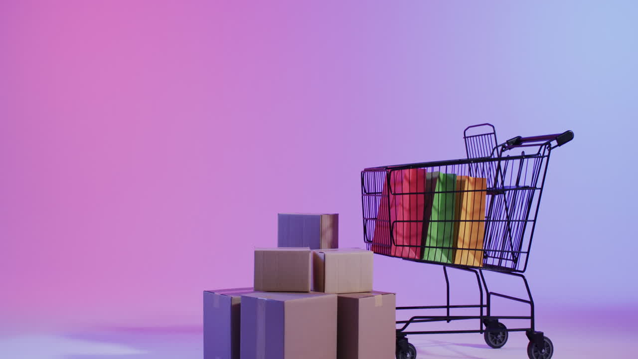 video de un carrito de compras y cajas con espacio de copia sobre un fondo rosa neón