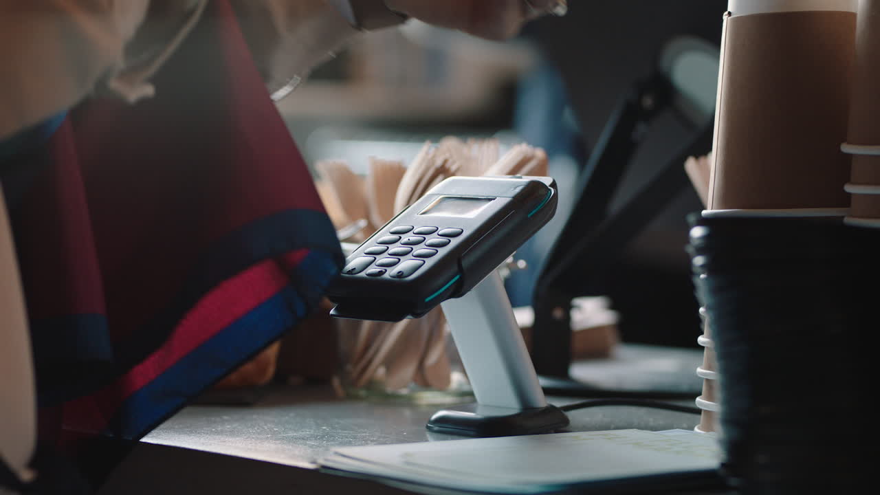 close up customer paying using smart watch mobile money transfer making contactless payment buying coffee in cafe enjoying service at restaurant