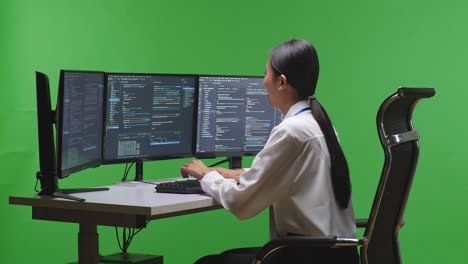 woman programmer working on code