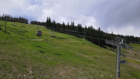 A-scenic-drone-pan-around-the-village-of-copper-mountain-in-silverthorne,-colorado-during-the-summer