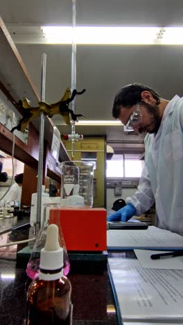 experimental setup with scientist reading protocol