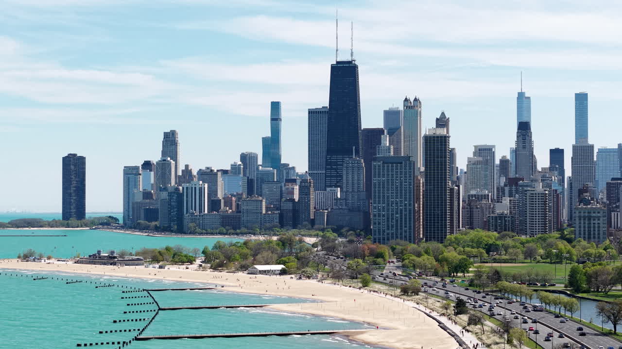 Drone Shot of Chicago Cityscape Skyline, Downtown Skyscrapers and Traffic on Lake Shore Drive