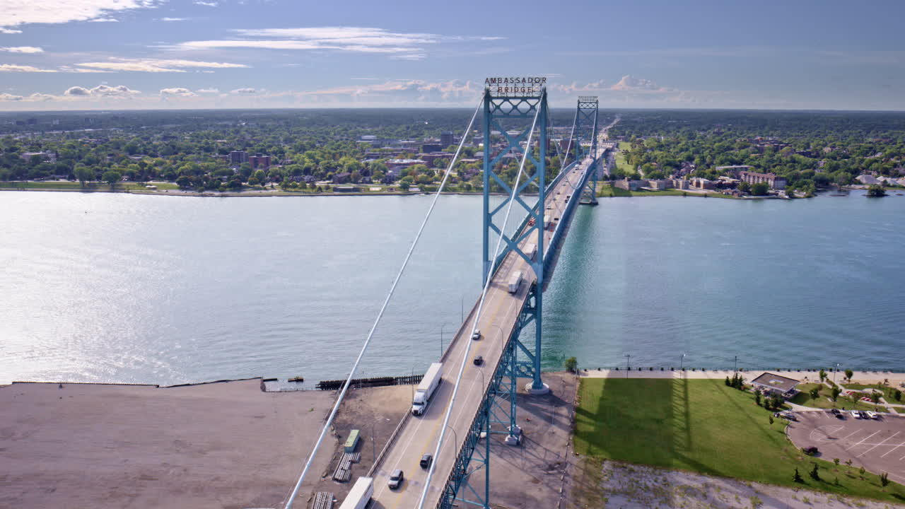 Cinematic aerial view showcasing the international bridge between Canada and the U.S