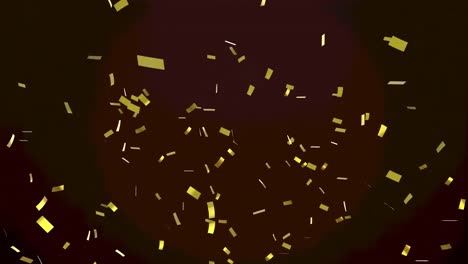 Animation-of-gold-confetti-floating-over-red-spotlight-on-black-background