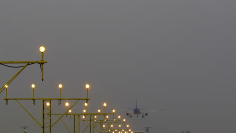 airplane landing in foggy conditions